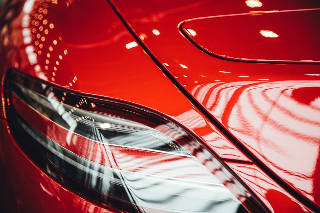 Close-up of polished paintwork reflecting light after a ceramic coating