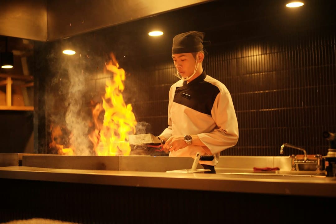 Open fire cooking in the Ember & Vine kitchen