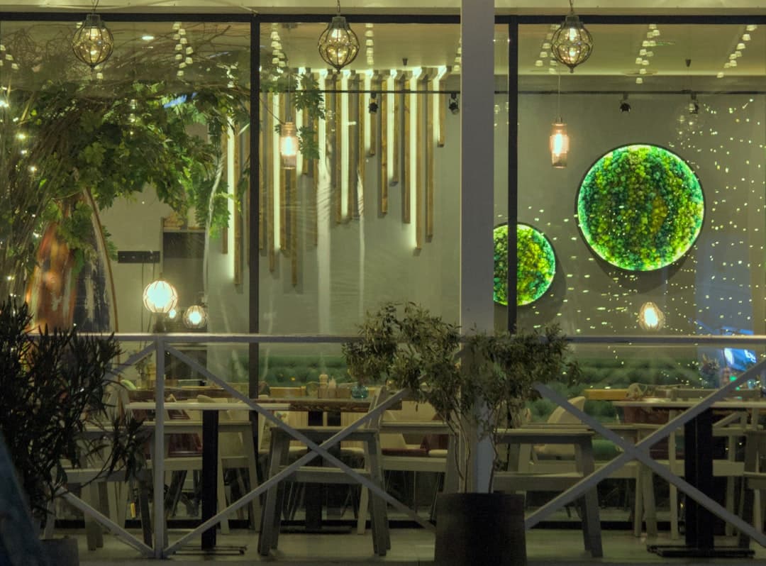 Warm, atmospheric dining room at Ember & Vine Kitchen